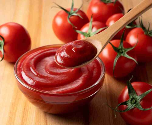 Ketchup on a wooden spoon