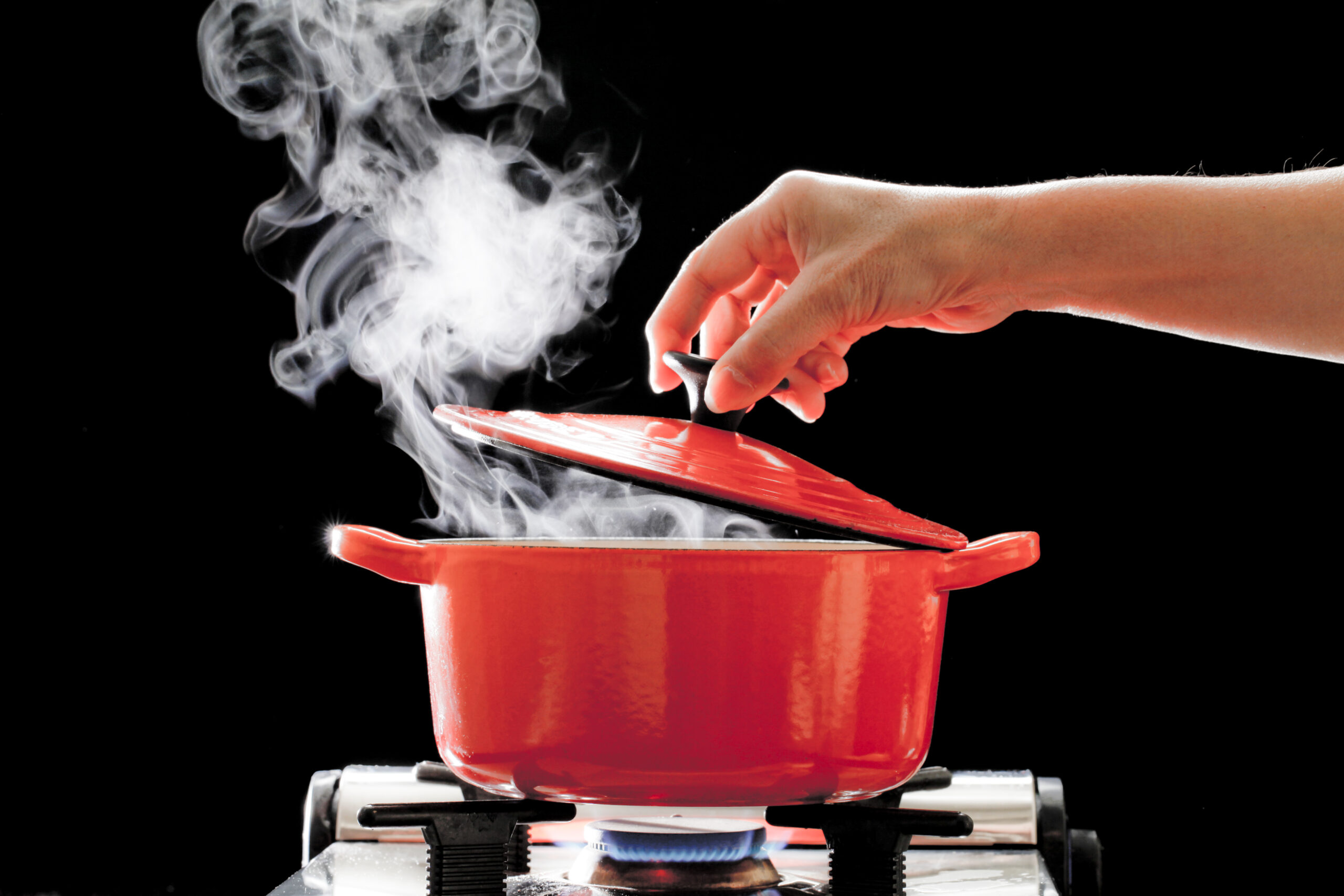 take the lid of a pot