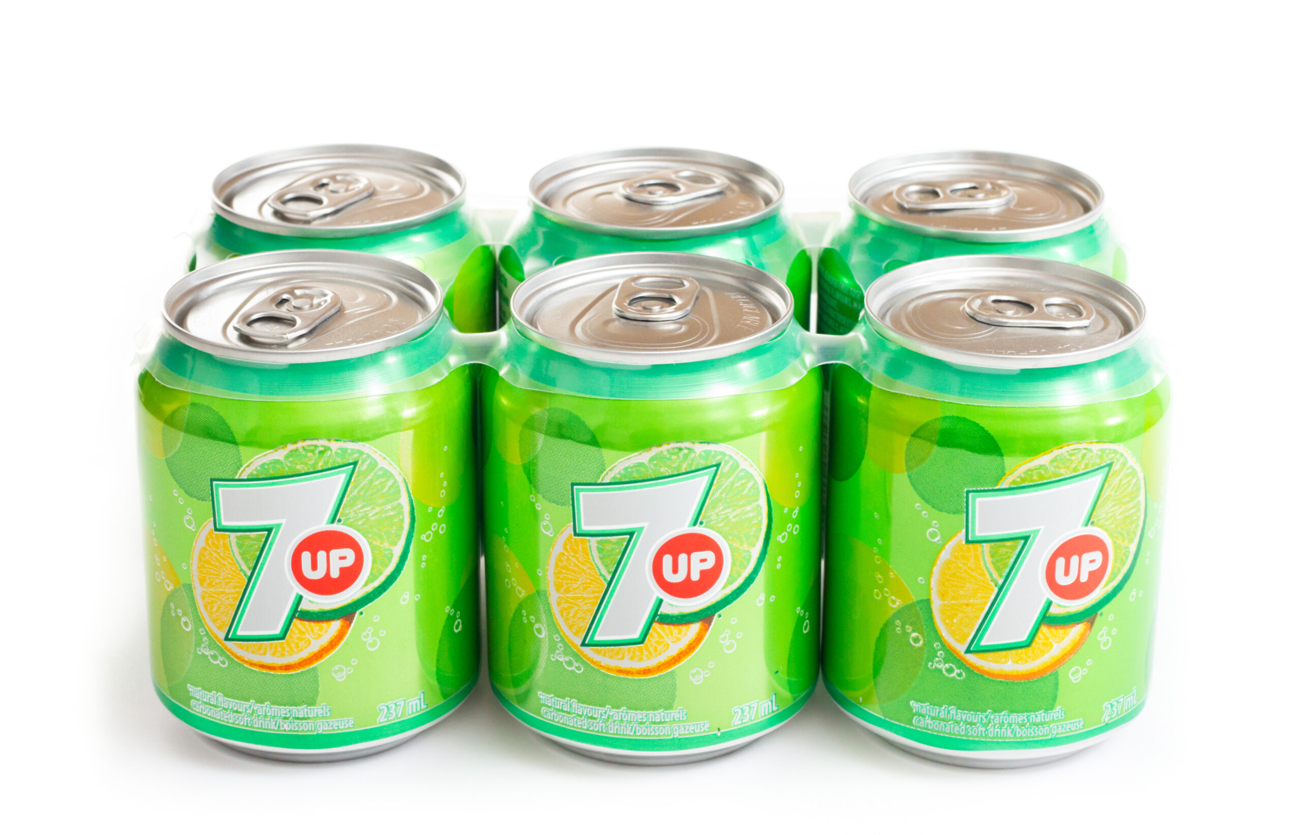 Chatham, Ontario, Canada - March 4, 2011: Product shot of a 6-pack of 7UP isolated on white, this shot featuring the smaller variety of cans. The 7UP brand is a part of the Dr Pepper Snapple Group, Inc., (DPSG).