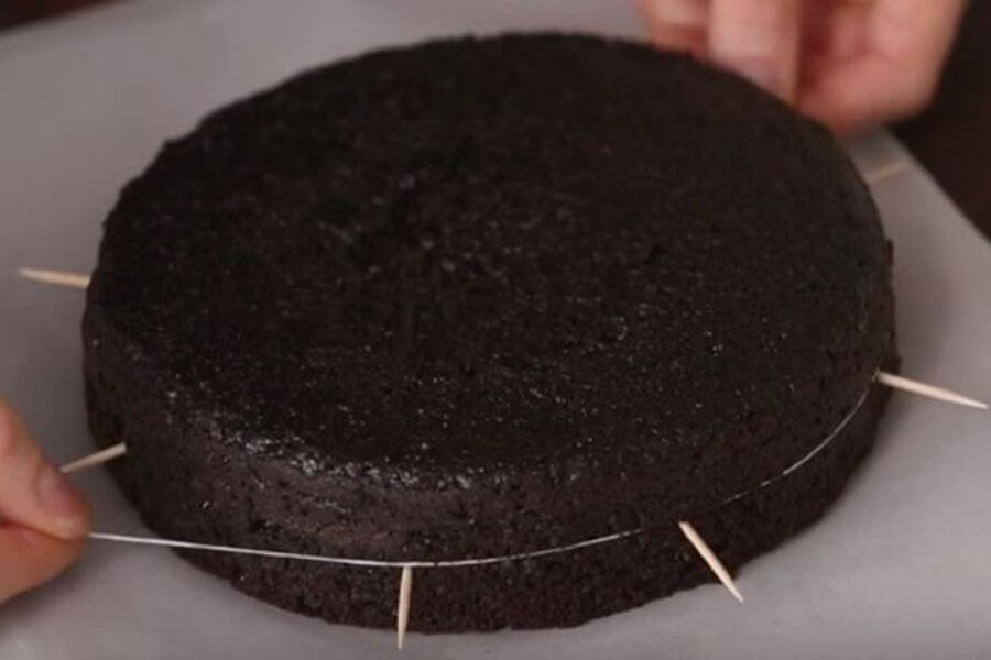 soft chocolate cake sponge cutted with dental floss
